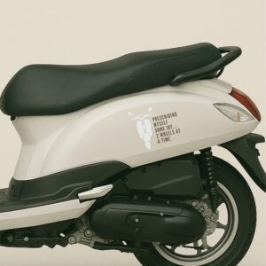 Sticker featuring a silhouette of a scooter and the quote “Prescribing myself some joy… 2 wheels at a time” in bold red-orange text — designed for doctors.