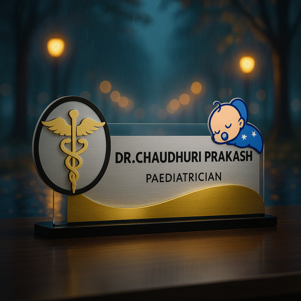 Pediatrician desk name plate with sleeping baby and caduceus design in gold and silver acrylic