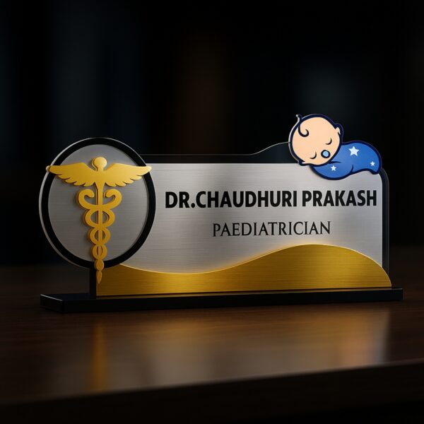 Pediatrician desk name plate with sleeping baby and caduceus design in gold and silver acrylic