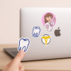 Set of 5 vinyl doctor-themed stickers including a cartoon doctor, syringe, molar tooth, Caduceus symbol, and “Super Doctor” quote — perfect for laptops and bottles.