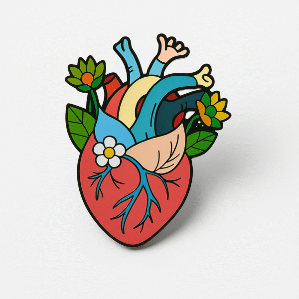 Vibrant anatomical heart brooch with floral detailing, designed exclusively for medical professionals.