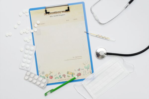 Personalized dental prescription pad with fun tooth illustrations, patient details section, and Dr. Khushboo Mishra’s name printed at the top.