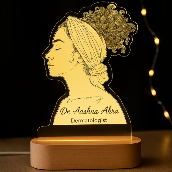 Personalized LED night light for dermatologists with an elegant profile illustration of a woman wearing a headband, engraved with “Dr. Aashna Akka – Dermatologist.”