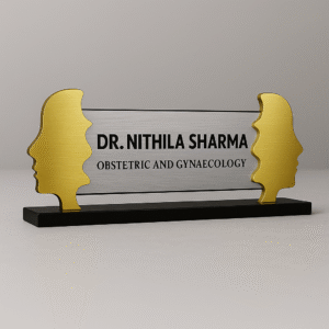 Custom acrylic name plate for gynecologist with gold female silhouette profiles and metallic finish