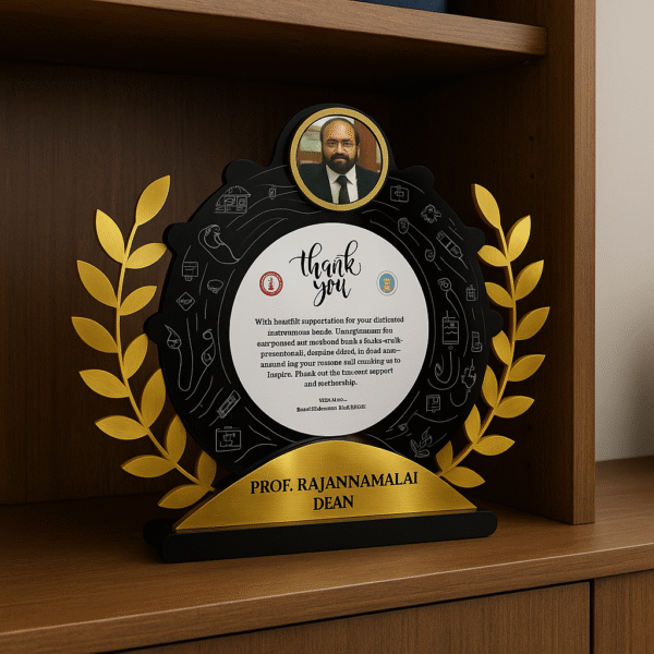 Customized doctor appreciation memento with golden laurel, photo slot, and thank you message placed outdoors near a scenic waterfall.