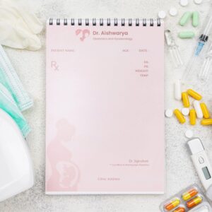 Elegant pink prescription pad designed for obstetricians and gynaecologists, featuring a silhouette of a pregnant woman with fetus illustration, and patient information layout.