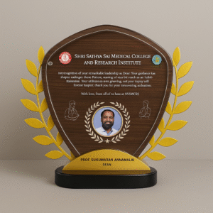 Wood-finish shield-shaped memento with golden laurel branches, custom text, and dean’s photo, awarded by a medical college.