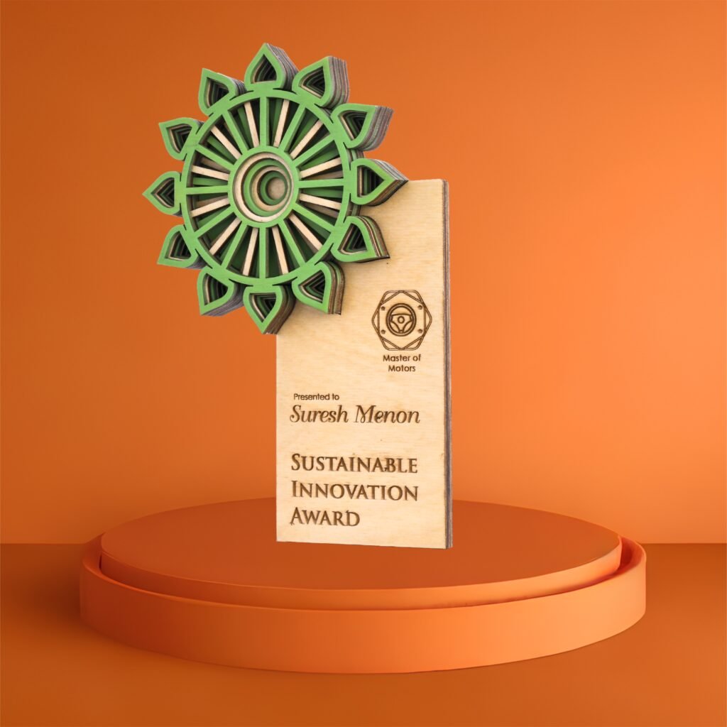 Wooden doctor award with green mandala-style design and engraved text, presented for sustainable medical innovation.