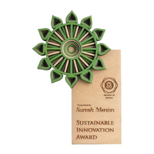 Wooden doctor award with green mandala-style design and engraved text, presented for sustainable medical innovation.