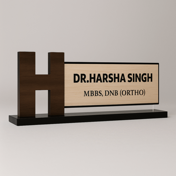 Orthopedic doctor name plate with bold H monogram, wooden base, and engraved acrylic panel for clinic desk