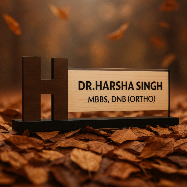 Orthopedic doctor name plate with bold H monogram, wooden base, and engraved acrylic panel for clinic desk