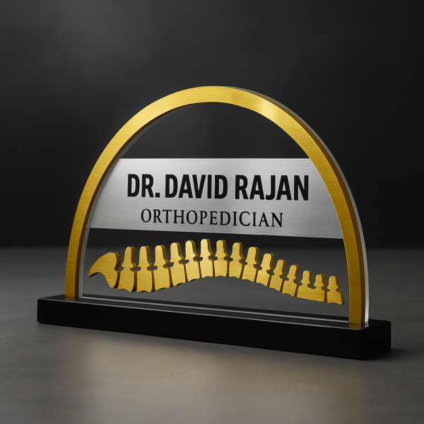 Custom orthopedic doctor name plate with spine vertebrae design in acrylic and gold finish