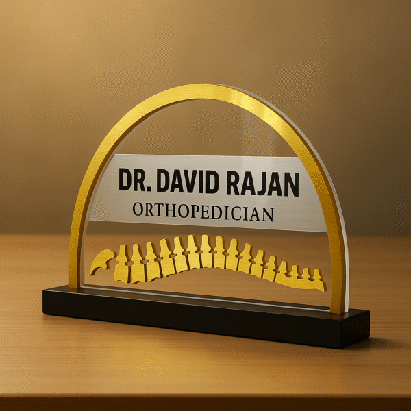 Custom orthopedic doctor name plate with spine vertebrae design in acrylic and gold finish