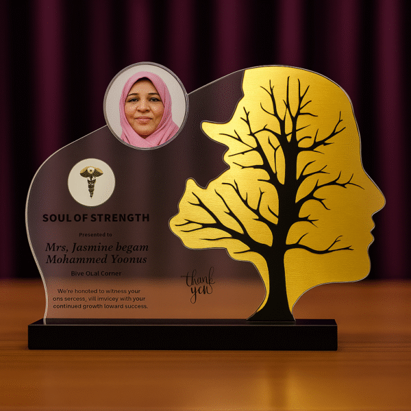 Doctor memento shaped like a head silhouette with a golden tree design, personalized with photo, name, and message on a black base.