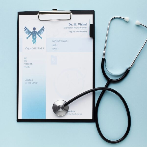 Prescription pad for Dr. M. Vishal of VM Hospitals with a gradient blue design and winged DNA logo.