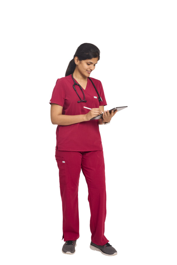 Female doctor in burgundy scrub set with stethoscope and tablet – stylish, breathable medical wear