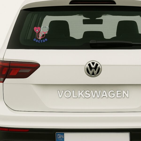 Car sticker with a red heart connected to a stethoscope forming a second heart, with the word “DOCTOR” written below in bold blue outline letters.