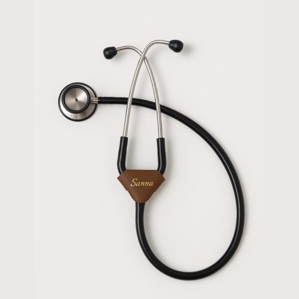 Dark brown leather stethoscope name tag with engraved name "Sanna" in golden finish