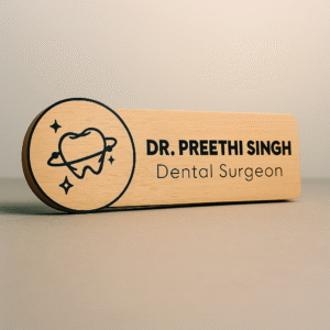 Personalized wooden doctor name badge with engraved sparkling tooth icon and custom text for dental surgeon