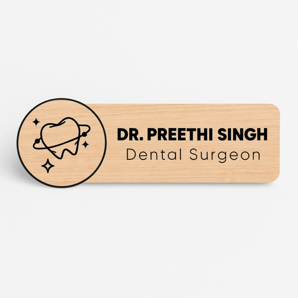 Personalized wooden doctor name badge with engraved sparkling tooth icon and custom text for dental surgeon