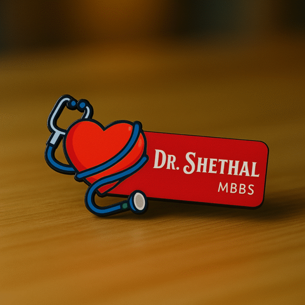 Cute doctor name badge featuring a heart wrapped in a stethoscope with custom name and MBBS title on